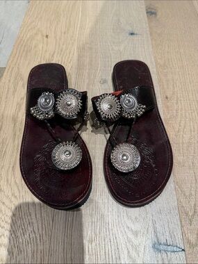 Handcrafted Black Leather Sandals with Silver Concho Accents